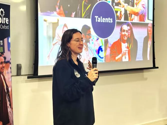 Person pitching at an event
