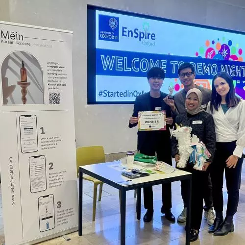 first place 2024 demo night winners, Mein Skincare, with their prizes