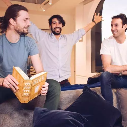 three men sitting