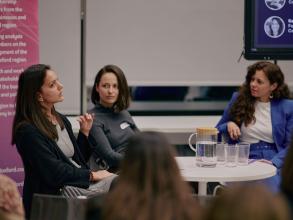 Panellists deep in discussion during an event