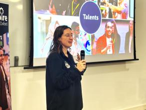 Person pitching at an event