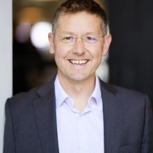 A head shot of Stuart Wilkinson