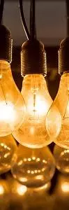 A group of lightbulbs hanging from a ceiling